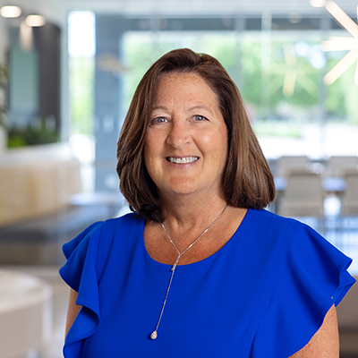 Headshot for Dana Chapel in Chelsea Groton Headquarters